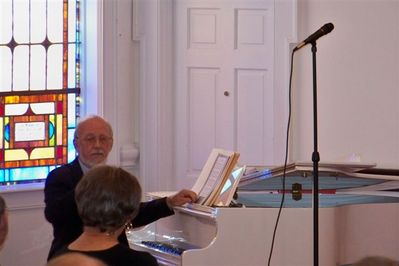 Rev. Russell Lewis plays prelude
