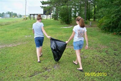 Moriah & Jessica picking up trash
