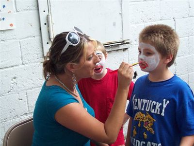 Kelley paints faces

